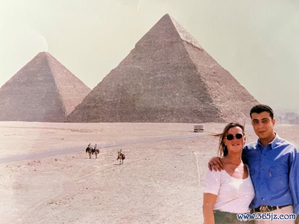 Egypt romance: Christina Ward had only known Wahid Kandil for six months when he asked her to marry him. The couple fell in love sailing on a boat down the River Nile in Egypt. Here they are pictured by the Giza pyramids.