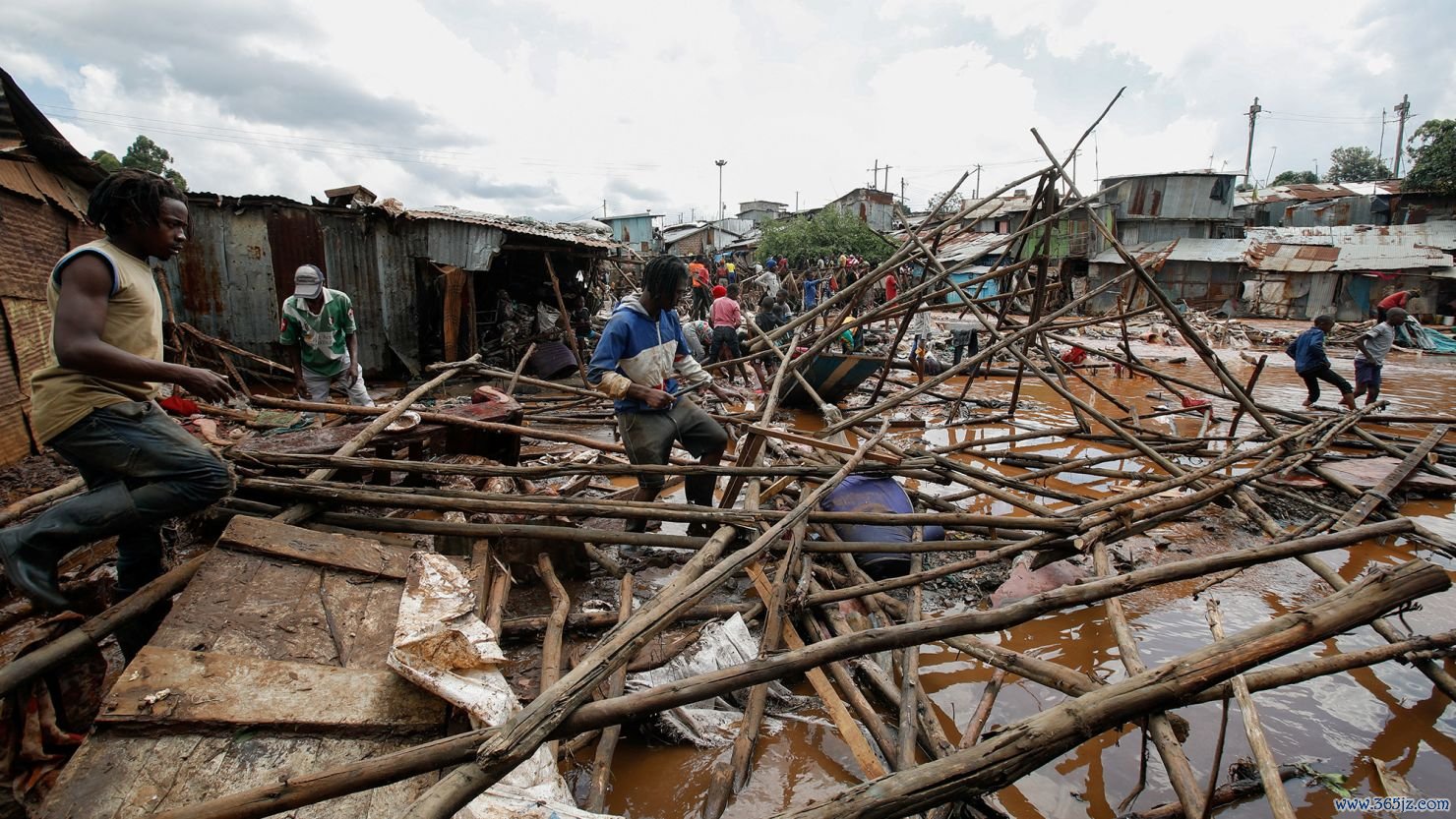 Residents sift through the rubble after the Nairobi river burst its banks and destroyed their homes within the Mathare Valley settlement in Nairobi, Kenya on April 24, 2024.