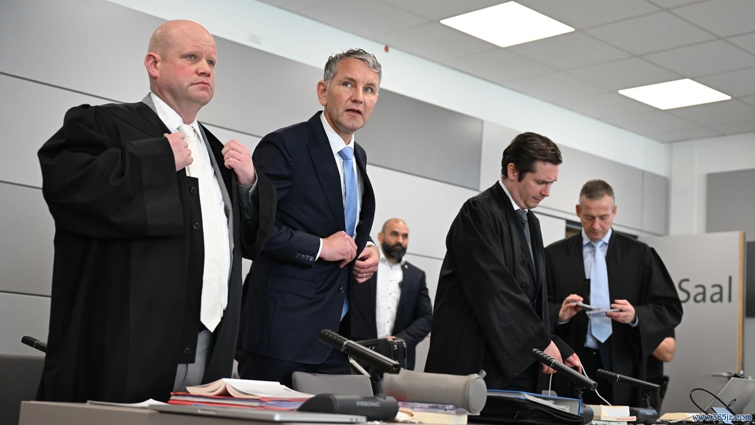 Björn Höcke, chairman of the Thuringian AfD (second from left) stands next to his lawyers during the trial on April 18, 2024.
